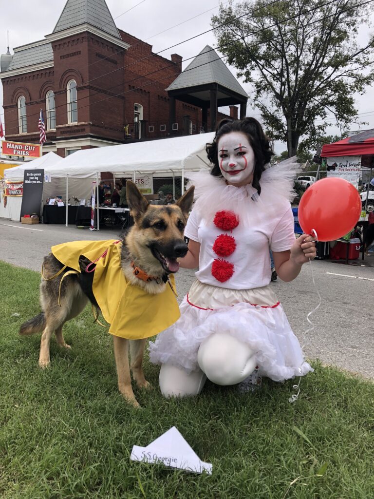 Dog and person in costume